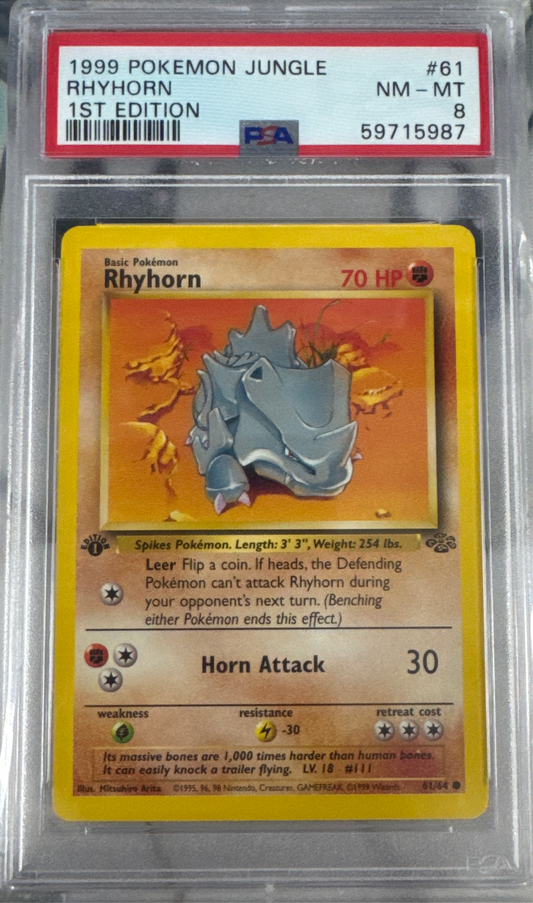 1999 POKEMON JUNGLE #61 RHYHORN 1ST EDITION PSA 8